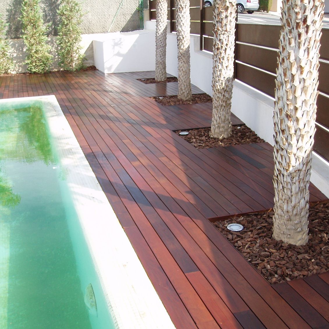 Tarimas Parquet Vega Baja Stylo piscina y suelo de madera